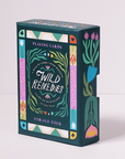 Wild Remedies playing card boxes with botanical designs and herbal educational information