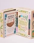 Woodland Treasures playing card boxes with botanical designs and forest educational information