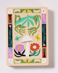 Illustrated playing card back with nature-themed design for Wooland Treasures deck
