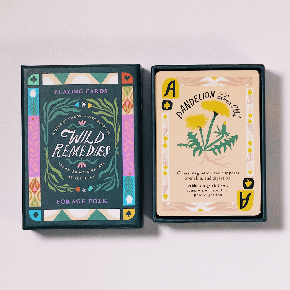 Wild Remedies card game box with text about plant identification